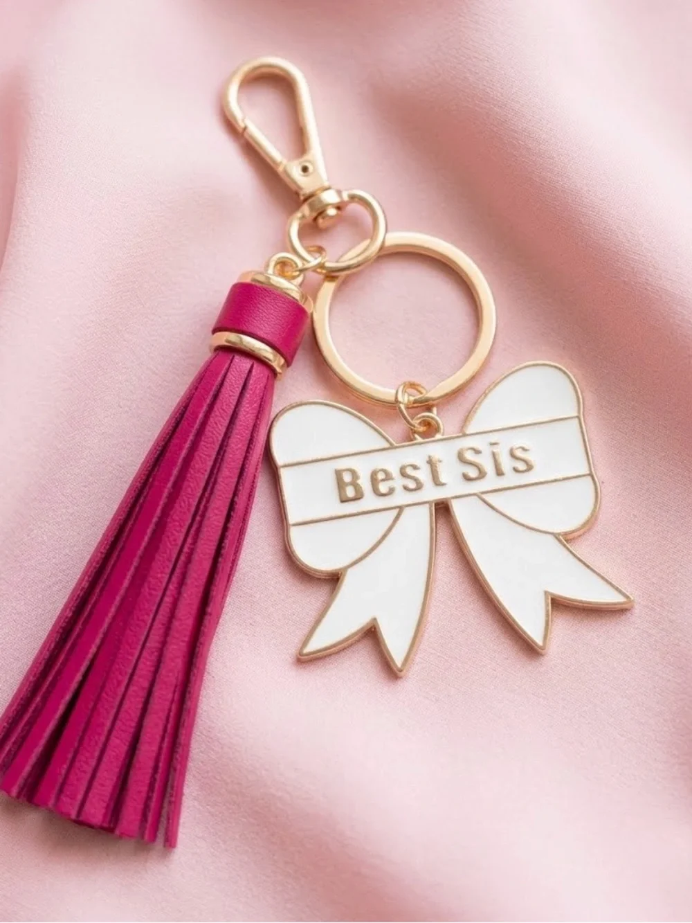 Best Sis Enamel Bow Keychain with Pink Tassel and Gold Hardware